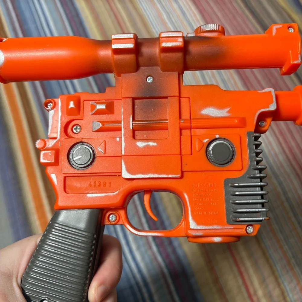 Disney Star Tours Star Wars Han Solo DL-44 Blaster Toy Orange Silver Weathered